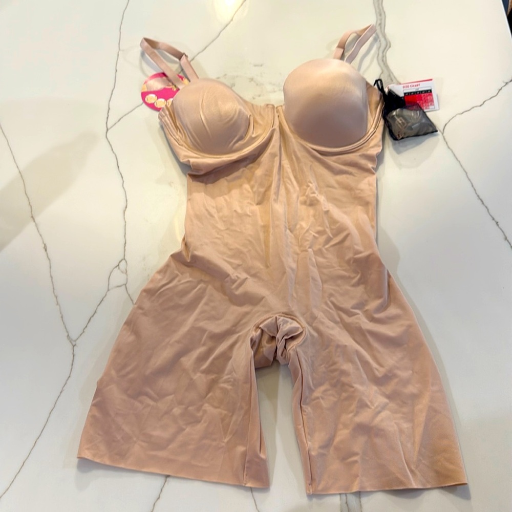 NWT SPANX Suit Your Fancy Strapless Cupped Mid-Thigh Body Suit. In size medium.